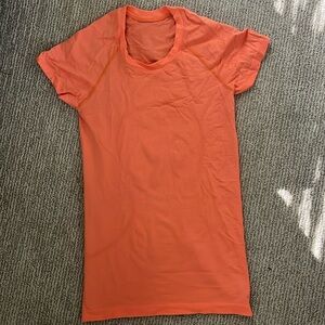 orange swiftly tank slightly used